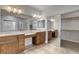 Bright bathroom featuring dual sinks, vanity space, and a spacious walk-in closet at 5903 Karnes Ranch Ave, Las Vegas, NV 89131