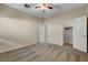 Neutral bedroom with ceiling fan, carpet flooring and closet at 5903 Karnes Ranch Ave, Las Vegas, NV 89131