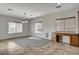 Bright dining area with large windows and view of built-in kitchen workstation at 5903 Karnes Ranch Ave, Las Vegas, NV 89131