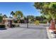 View of the community entrance gate and private property notices under a clear sky at 5903 Karnes Ranch Ave, Las Vegas, NV 89131