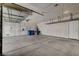 Spacious garage with overhead storage and room for two cars at 5903 Karnes Ranch Ave, Las Vegas, NV 89131