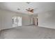 Comfortable main bedroom has sliding doors and an ensuite bathroom access at 5903 Karnes Ranch Ave, Las Vegas, NV 89131