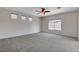 Spacious main bedroom features a ceiling fan and plenty of natural light at 5903 Karnes Ranch Ave, Las Vegas, NV 89131