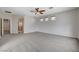 Large main bedroom offers a ceiling fan, neutral colors, and plush carpeting at 5903 Karnes Ranch Ave, Las Vegas, NV 89131