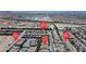 Neighborhood aerial view showing home's location in relation to nearby streets, commercial areas, and mountain views at 5965 Sierra Medina Ave, Las Vegas, NV 89139