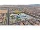 An aerial view showing the neighborhood school and surrounding homes in the community at 5965 Sierra Medina Ave, Las Vegas, NV 89139
