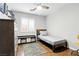 Cozy bedroom featuring built-in shelving for extra storage and decor at 5965 Sierra Medina Ave, Las Vegas, NV 89139
