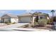 Charming single-story home featuring a tile roof, two-car garage, desert landscaping, and a spacious driveway at 5965 Sierra Medina Ave, Las Vegas, NV 89139