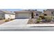 Charming home featuring a tile roof, low-maintenance landscaping and a two-car garage at 5965 Sierra Medina Ave, Las Vegas, NV 89139