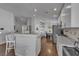 Bright and airy open-concept kitchen and dining area with bar-style seating at 5965 Sierra Medina Ave, Las Vegas, NV 89139