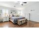 Bright, spacious main bedroom with natural light and hardwood floors at 5965 Sierra Medina Ave, Las Vegas, NV 89139