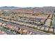 Overhead view of neighborhood featuring houses with solar panels and well-maintained roads at 5965 Sierra Medina Ave, Las Vegas, NV 89139