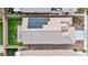 Aerial view of a home featuring a well-maintained roof with solar panels and a spacious backyard at 5965 Sierra Medina Ave, Las Vegas, NV 89139
