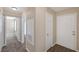 Hallway leading to rooms featuring new flooring and freshly painted walls at 6250 W Flamingo Rd # 51, Las Vegas, NV 89103