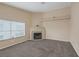Cozy living room area with fireplace and large windows overlooking desert landscape at 6250 W Flamingo Rd # 51, Las Vegas, NV 89103