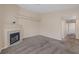 A cozy living room featuring a fireplace and neutral-toned walls at 6250 W Flamingo Rd # 51, Las Vegas, NV 89103