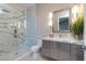 Elegant bathroom features a marble walk-in shower and sleek vanity at 661 Dragon Peak Dr, Henderson, NV 89012