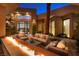 Outdoor courtyard featuring a fire pit and comfortable seating arrangements at 661 Dragon Peak Dr, Henderson, NV 89012
