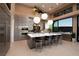 Modern kitchen with a large island, sleek cabinets, and stainless steel appliances, perfect for entertaining at 661 Dragon Peak Dr, Henderson, NV 89012