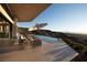 Scenic patio featuring an infinity pool and mountain views at 661 Dragon Peak Dr, Henderson, NV 89012