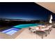 Enjoy sunset views over the city from this zero-edge pool and jacuzzi at 661 Dragon Peak Dr, Henderson, NV 89012