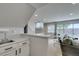 Bright living area featuring contemporary furnishings and a convenient sink area at 7409 Central Butte Ave, Las Vegas, NV 89129