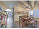 Dining room with vaulted ceilings and a view of the backyard through the window at 8204 Antler Pines Ct, Las Vegas, NV 89149