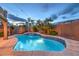 Sparkling pool and spa with lush landscaping, perfect for relaxation and entertainment at 8204 Antler Pines Ct, Las Vegas, NV 89149