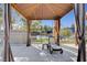 Inviting poolside cabana with comfortable lounge chair, offering a relaxing and shaded outdoor retreat at 8221 Crow Valley Ln, Las Vegas, NV 89113
