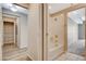 A bathroom view next to hallway with a closet and adjacent to a room with carpeting at 8255 S Las Vegas Blvd # 1404, Las Vegas, NV 89123