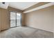 Spacious bedroom with a sliding glass door leading to a balcony, providing great views at 8255 S Las Vegas Blvd # 1404, Las Vegas, NV 89123