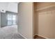A spacious room with carpeting, closet with shelving, and large window with city views at 8255 S Las Vegas Blvd # 1404, Las Vegas, NV 89123