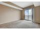 Bright bedroom with sliding glass door and a picturesque view at 8255 S Las Vegas Blvd # 1404, Las Vegas, NV 89123