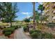 Well-maintained common area and garden include a walking path and mature landscaping at 8255 S Las Vegas Blvd # 1404, Las Vegas, NV 89123
