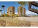 Modern condo towers feature spacious balconies and stylish design, surrounded by lush landscaping and scenic views at 8255 S Las Vegas Blvd # 1404, Las Vegas, NV 89123