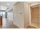 Hallway featuring wood-look flooring and a view of the living area, adding to the home's appeal at 8255 S Las Vegas Blvd # 1404, Las Vegas, NV 89123