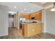 Kitchen featuring wood cabinets, stainless steel appliances, and wood-style floors at 8255 S Las Vegas Blvd # 1404, Las Vegas, NV 89123