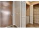 Hallway closet showing side by side laundry machines and built in shelves at 8255 S Las Vegas Blvd # 1404, Las Vegas, NV 89123