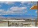 The balcony has views of the city, nearby mountains and blue skies at 8255 S Las Vegas Blvd # 1404, Las Vegas, NV 89123
