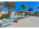 Resort-style pool area with contemporary lounge seating, fire pit, and lush landscaping for relaxation at 8255 S Las Vegas Blvd # 1404, Las Vegas, NV 89123