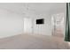 Bright, spacious bedroom with ceiling fan, TV, and large windows for natural light at 828 Parker Mesa St, Las Vegas, NV 89138