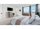 Modern bedroom with large window and neutral color palette at 828 Parker Mesa St, Las Vegas, NV 89138