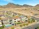 New home exteriors in a planned community, some with pools and solar panels at 828 Parker Mesa St, Las Vegas, NV 89138