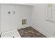 Clean laundry room with hexagonal tile flooring and essential hookups at 828 Parker Mesa St, Las Vegas, NV 89138