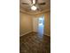 Bedroom featuring wood-look flooring, a fan, and neutral-colored walls at 83 Rock Run St, Las Vegas, NV 89148