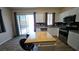 Spacious kitchen featuring stainless steel appliances, ample counter space, and a breakfast bar area at 83 Rock Run St, Las Vegas, NV 89148