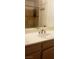 Bathroom featuring a sink, vanity, and a mirror at 857 Lantham Pl, Las Vegas, NV 89110