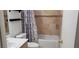 Bathroom featuring a white sink, toilet, bathtub, shower, and decorative shower curtain at 857 Lantham Pl, Las Vegas, NV 89110