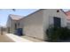 Charming single-story home exterior with stucco siding and a red tile roof; lush rose bushes add to the curb appeal at 857 Lantham Pl, Las Vegas, NV 89110