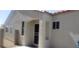 Exterior view of the front entry way featuring stucco siding at 857 Lantham Pl, Las Vegas, NV 89110
